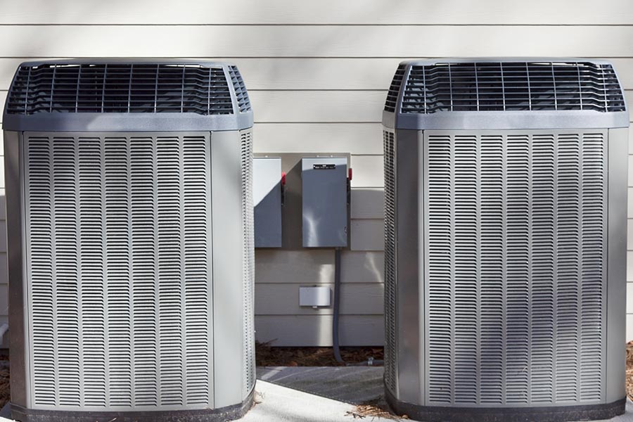 Two AC condenser units outside